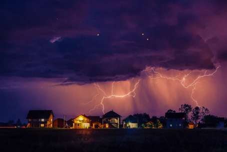 lightning striking near residential homes